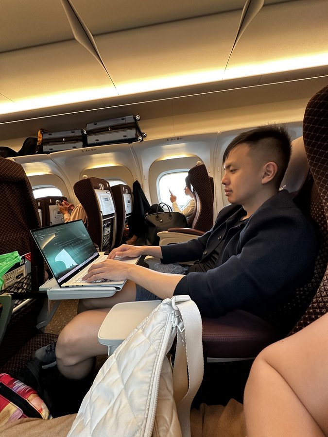 Cabin. Client calls at 35,000 feet.